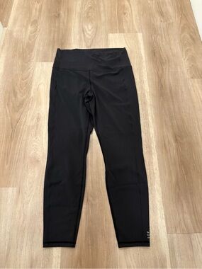 Left on Friday  Super Moves Tight HIGH RISE 7/8" LENGTH